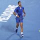 Novak Djokovic of Serbia reacts during his second round match against Alexei Popyrin of Australia at the Australian Open tennis championships at Melbourne Park, Melbourne, Australia, Wednesday, Jan. 17, 2024. (AP Photo/Asanka Brendon Ratnayake)