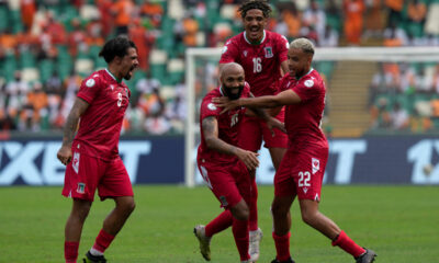 Equatorial Guinea's Emilio Nsue, centre, celebrates with his teammates after scoring his side's third goal during the African Cup of Nations Group A soccer match between Equatorial Guinea and Guinea Bissau, at the Alassane Ouattara Olympic stadium, in Abidjan, Ivory Coast, Thursday, Jan. 18, 2024. (AP Photo/Sunday Alamba)
