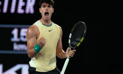 Carlos Alcaraz of Spain reacts after winning the first set against Richard Gasquet of France during their first round match at the Australian Open tennis championships at Melbourne Park, Melbourne, Australia, Tuesday, Jan. 16, 2024. (AP Photo/Andy Wong)