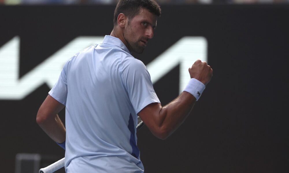 Novak Djokovic of Serbia reacts after winning the first set against Taylor Fritz of the U.S. during their quarterfinal match at the Australian Open tennis championships at Melbourne Park, Melbourne, Australia, Tuesday, Jan. 23, 2024. (AP Photo/Asanka Brendon Ratnayake)