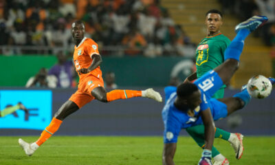 Ivory Coast's Nicolas Pepe, left, in action against Senegal's goalkeeper Edouard Mendy during the African Cup of Nations round of 16 soccer match between Senegal and Ivory Coast, at the Charles Konan Banny stadium in Yamoussoukro, Ivory Coast, Monday, Jan. 29, 2024. (AP Photo/Themba Hadebe)
