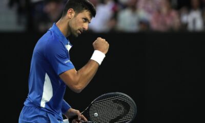 Serbia's Novak Djokovic reacts during his first round match against Croatia's Dino Prizmic at the Australian Open tennis championships at Melbourne Park, Melbourne, Australia, Sunday, Jan. 14, 2024. (AP Photo/Andy Wong)