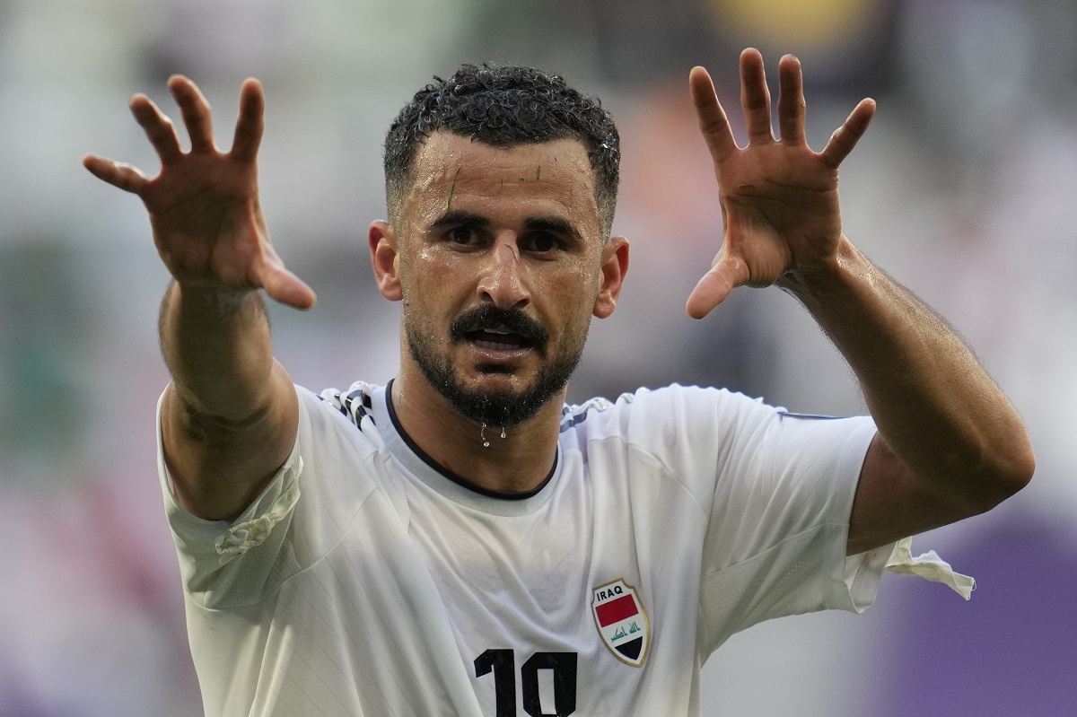 Iraq's Aymen Hussein celebrates after scoring his side's second goal during the Asian Cup Group C soccer match between Iraq and Japan at the Education City Stadium in Al Rayyan, Qatar, Friday, Jan. 19, 2024. (AP Photo/Aijaz Rahi)