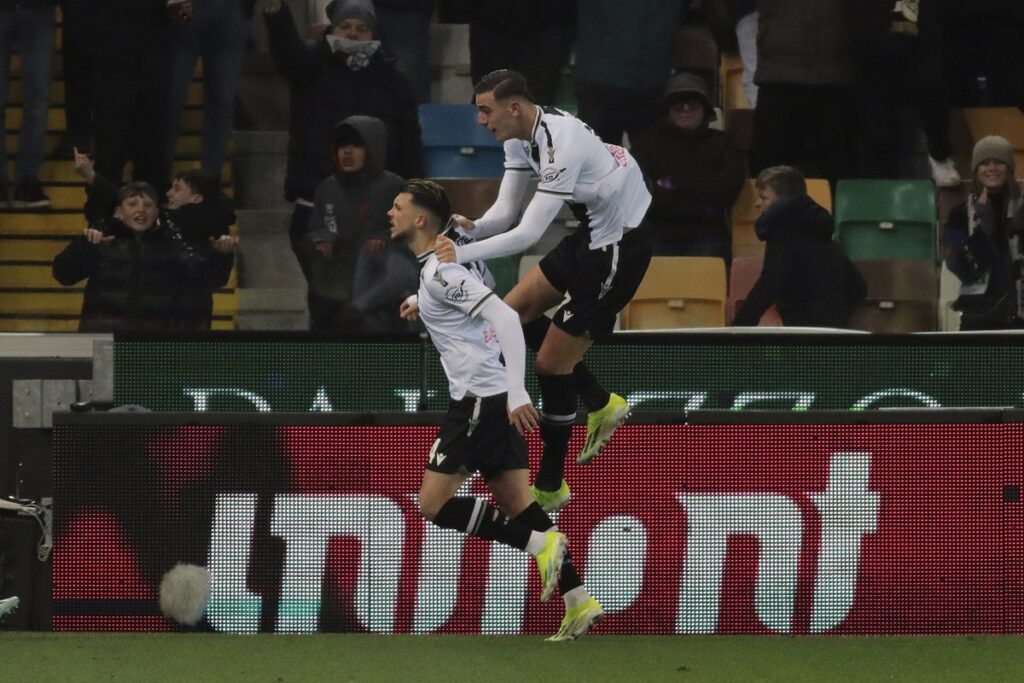 Udinese's Lazar Samardzic, left, celebrates scoring during the Serie A soccer match between Udinese and Milan in Udine, Italy, Saturday Jan. 20, 2024. (Andrea Bressanutti/LaPresse via AP)