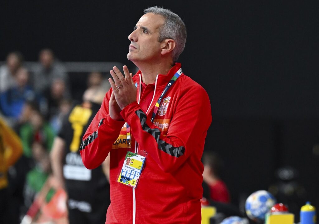 Serbis'a head coach Antonio Gerona Salaet attends the Handball European Championship preliminiary round Group C match between Serbia and Montenegro in Munich, Germany, Tuesday, Jan. 16, 2024. (Sven Hoppe/dpa via AP)