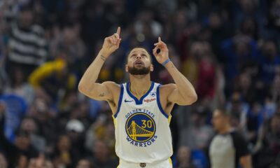 Golden State Warriors guard Stephen Curry reacts after scoring a 3-point basket against the Atlanta Hawks during the first half of an NBA basketball game, Wednesday, Jan. 24, 2024, in San Francisco. (AP Photo/Godofredo A. Vásquez)
