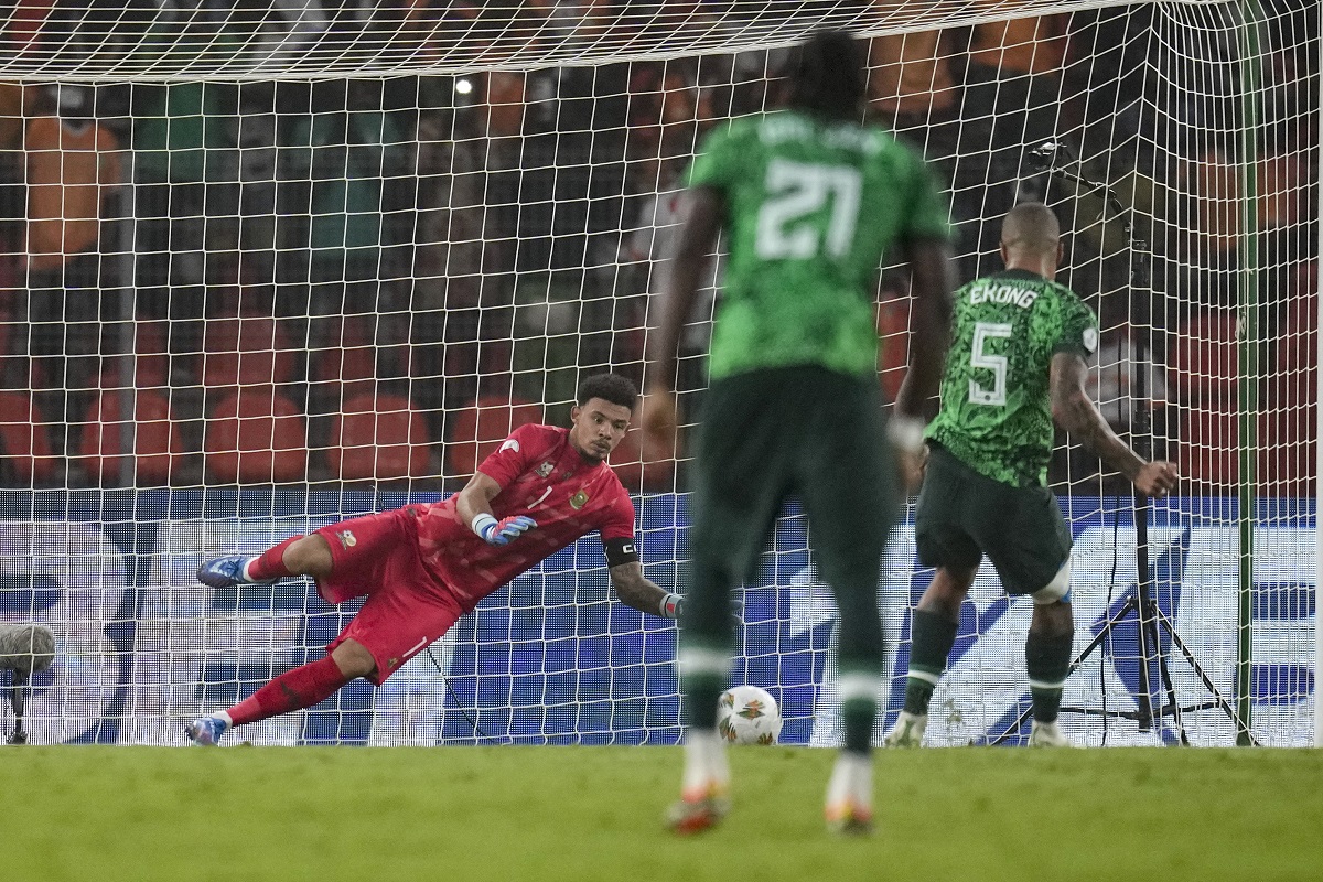 Nigeria's William Troost-Ekong, scores his side's first goal from the penalty spot during the African Cup of Nations semifinal soccer match between Nigeria and South Africa, at the Peace of Bouake stadium in Bouake Bouake, Ivory Coast, Wednesday, Feb. 7, 2024. (AP Photo/Themba Hadebe)