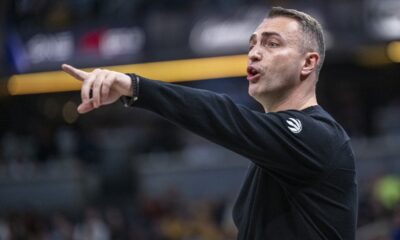 Toronto Raptors head coach Darko Rajakovic gestures during the first half of an NBA basketball game against the Indiana Pacers in Indianapolis, Monday, Feb. 26, 2024. (AP Photo/Doug McSchooler)