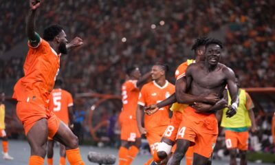 Ivory Coast 's Oumar Diakite, right, celebrates with teammates during the African Cup of Nations quarter final soccer match between Mali and Ivory Coast, at the Peace of Bouake stadium in Bouake, Ivory Coast, Saturday, Feb. 3, 2024. (AP Photo/Sunday Alamba)