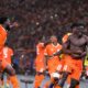 Ivory Coast 's Oumar Diakite, right, celebrates with teammates during the African Cup of Nations quarter final soccer match between Mali and Ivory Coast, at the Peace of Bouake stadium in Bouake, Ivory Coast, Saturday, Feb. 3, 2024. (AP Photo/Sunday Alamba)