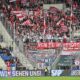 Berlin fans throw tennis balls on the pitch to protest the German soccer federation, during the German Bundesliga soccer match between TSG 1899 Hoffenheim and 1. FC Union Berlin at the PreZero Arena in Sinsheim, Germany, Saturday, Feb. 17, 2024. (Jan-Philipp Strobel/dpa via AP)