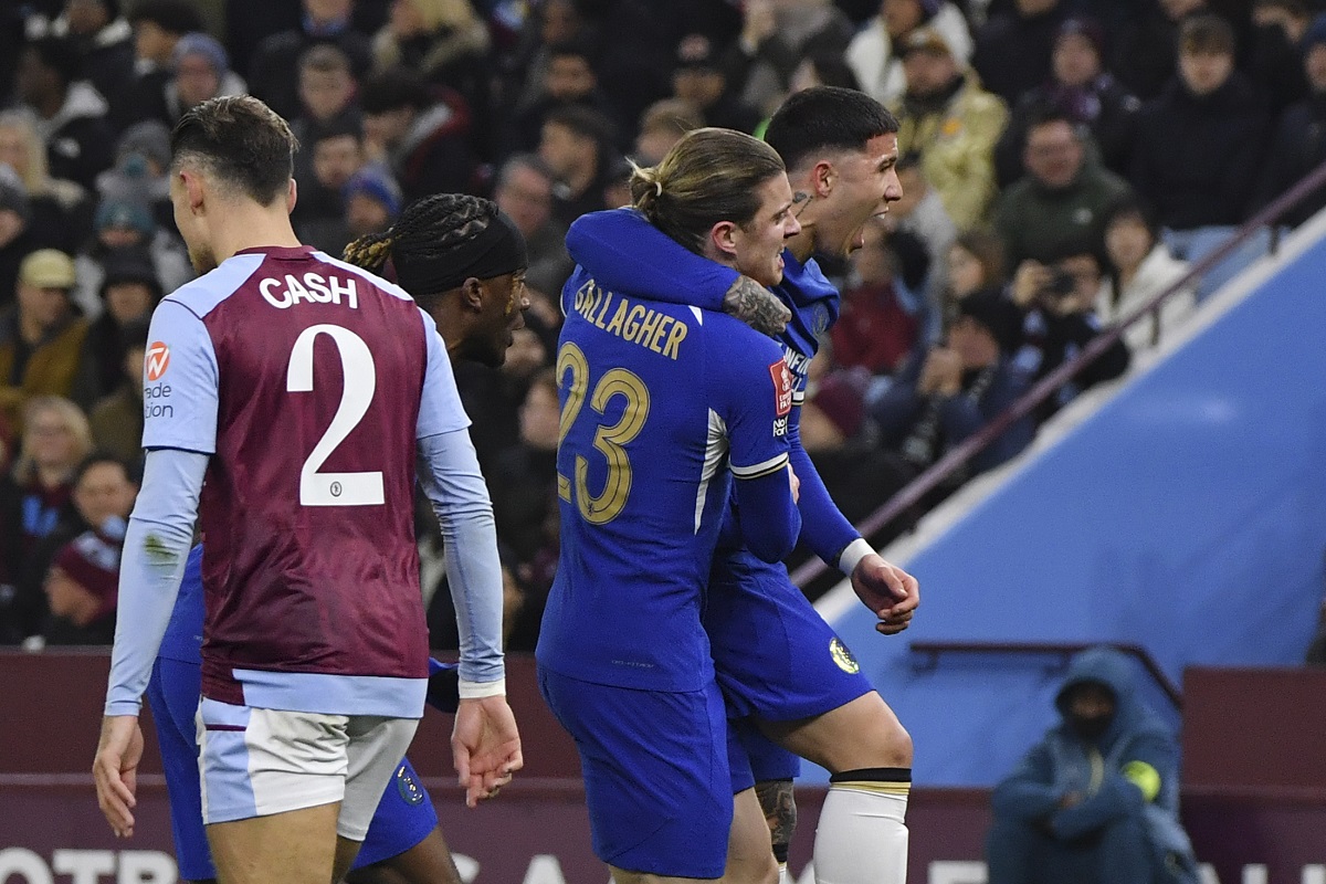 Chelsea's Conor Gallagher, second from right, celebrates with his teammates after scoring his side's opening goal during the English FA Cup fourth round soccer match between Aston Villa and Chelsea at the Villa Park Stadium in Birmingham, England, Wednesday, Feb. 7, 2024. (AP Photo/Rui Vieira)
