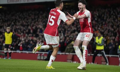 Arsenal's Jakub Kiwior, left, celebrates with Declan Rice after scoring his side's fourth goal during the English Premier League soccer match between Arsenal and Newcastle United at the Emirates stadium in London, England, Saturday, Feb. 24, 2024. (AP Photo/Alastair Grant)