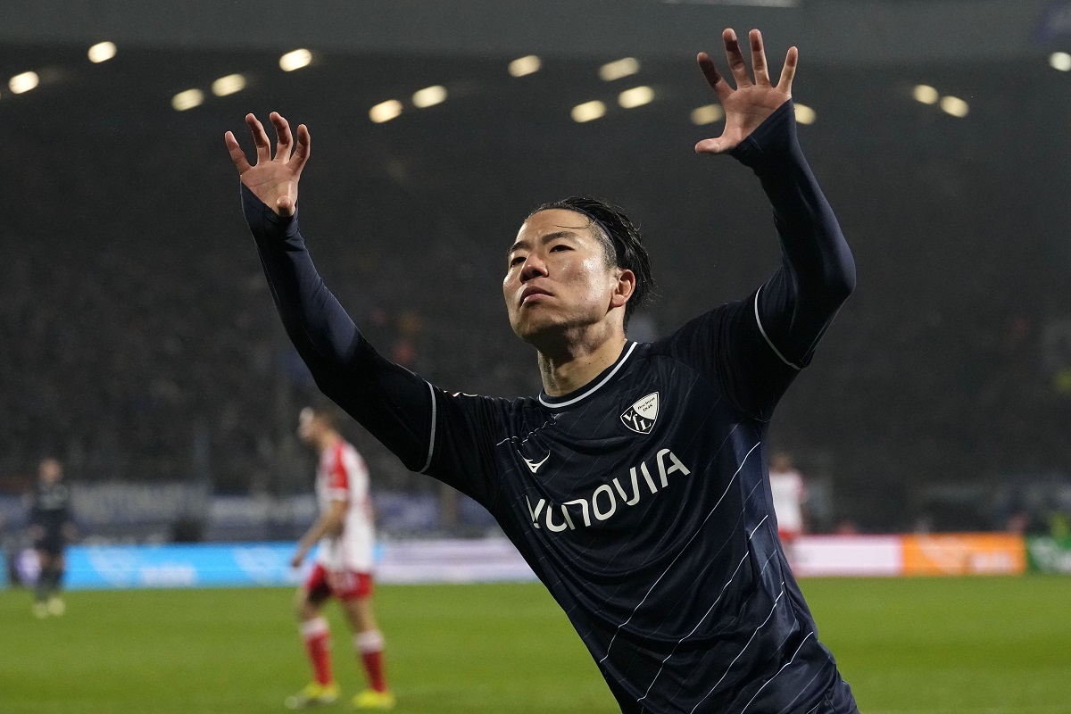 Bochum's Takuma Asano celebrates after scoring during the German Bundesliga soccer match between VfL Bochum and FC Bayern Munich in Bochum, Germany, Sunday, Feb. 18, 2024. (AP Photo/Martin Meissner)