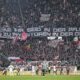 VfB Stuttgart fans hold a banner reading ''Clubs You have a duty - No to investors in the DFL'' during the Bundesliga soccer match between SC Freiburg and VfB Stuttgart at the Europa-Park Stadium in Freiburg im Breisgau, Germany, Saturday Feb. 3, 2024. (Harry Langer/dpa via AP)