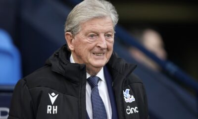 FILE -Crystal Palace's head coach Roy Hodgson waits for the start of the English Premier League soccer match between Manchester City and Crystal Palace at the Etihad Stadium in Manchester, England, Saturday, Dec.16, 2023. Crystal Palace says Roy Hodgson is stepping down as manager of the Premier League team. The 76-year-old former England coach was hospitalized last week after falling ill in training. The incident came amid reports that Palace was about to replace him as manager. (AP Photo/Dave Thompson, File)