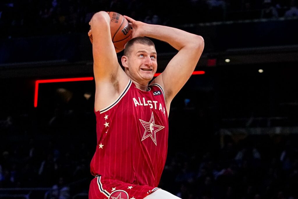 Denver Nuggets center Nikola Jokic (15) goes up for a shot during the first half of an NBA All-Star basketball game in Indianapolis, Sunday, Feb. 18, 2024. (AP Photo/Darron Cummings)