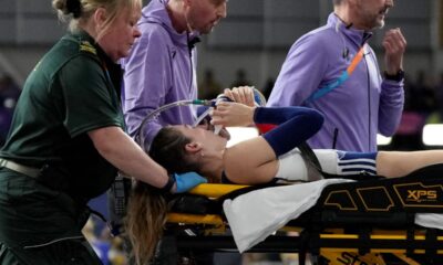 Margot Chevrier, of France, is carried on a stretcher after getting injured in the women's pole vault during the World Athletics Indoor Championships at the Emirates Arena in Glasgow, Scotland, Saturday, March 2, 2024. (AP Photo/Bernat Armangue)