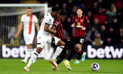 Luton Town's Chiedozie Ogbene, left and Bournemouth's Luis Sinisterra vie for the ball, during the English Premier League soccer match between Bournemouth and Luton Town, at the Vitality Stadium, in Bournemouth, England, Wednesday, March 13, 2024. (John Walton/PA via AP)