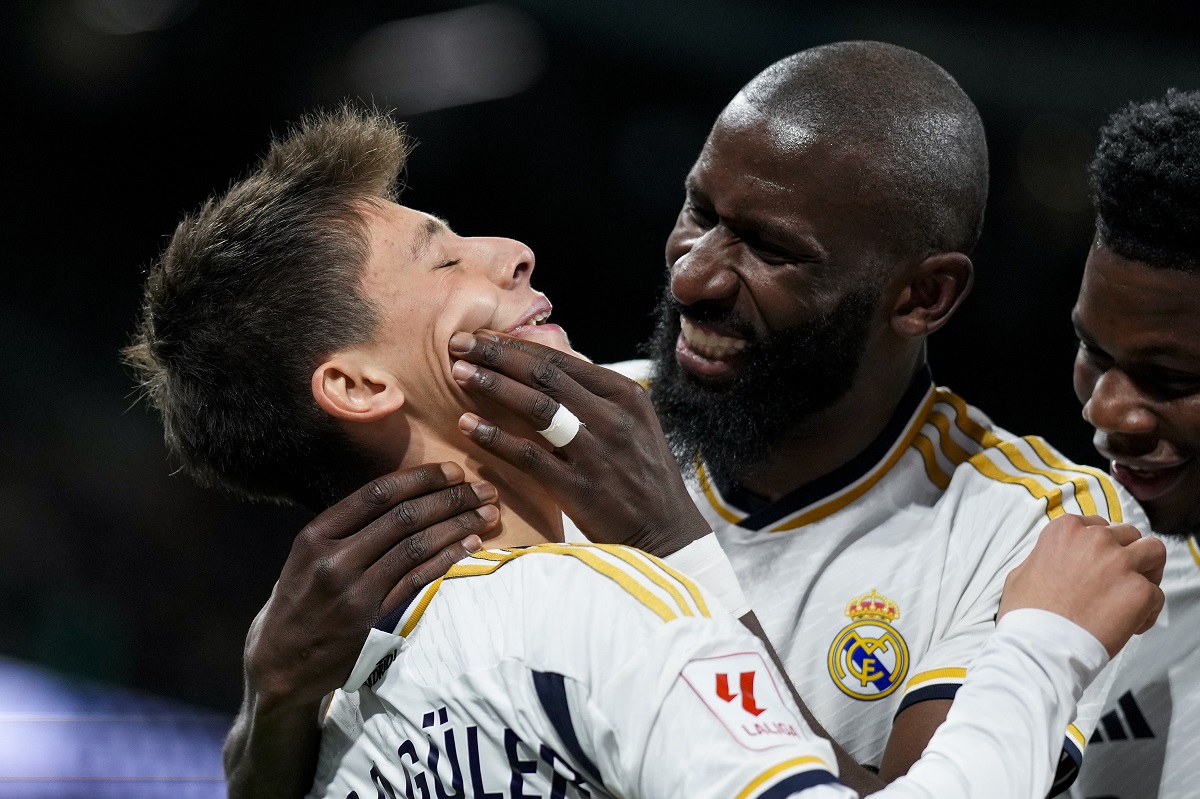Real Madrid's Arda Guler celebrates with his teammates after scoring his side's fourth goal the Spanish La Liga soccer match between Real Madrid and Celta Vigo at the Santiago Bernabeu stadium in Madrid, Spain, Sunday, March 10, 2024. (AP Photo/Manu Fernandez)