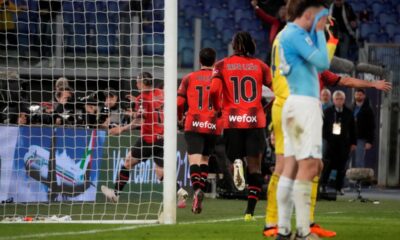 AC Milan's Noah Okafor celebrates with team mates after scoring his side's opening goal during the Italian Serie A soccer match between Lazio and Milan at Rome's Olympic stadium, Friday, March 1, 2024. (AP Photo/Gregorio Borgia)