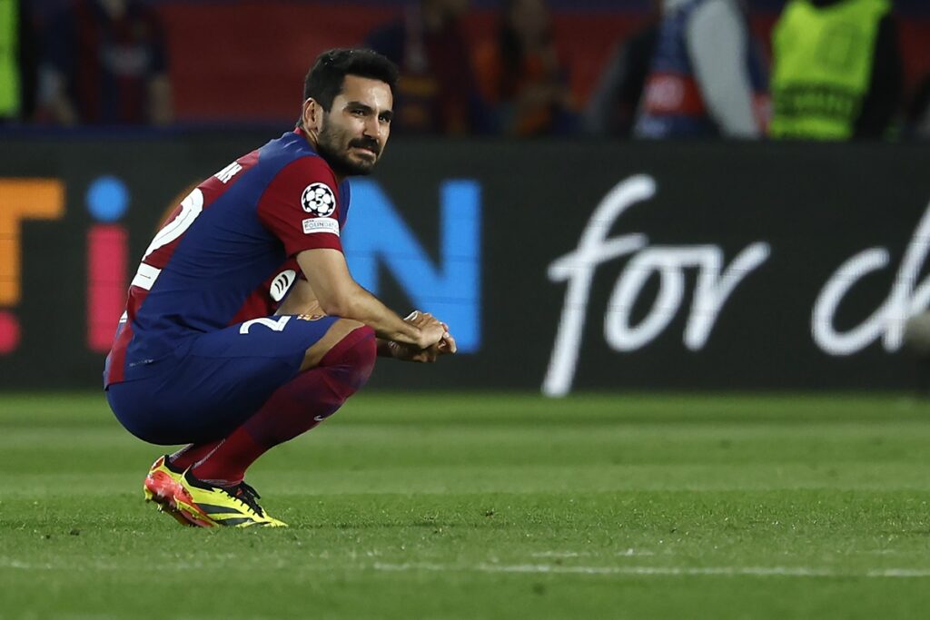 Barcelona's Ilkay Gundogan reacts at the end of the Champions League quarterfinal second leg soccer match between Barcelona and Paris Saint-Germain at the Olimpic Lluis Companys stadium in Barcelona, Spain, Tuesday, April 16, 2024. (AP Photo/Joan Monfort)