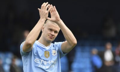 Manchester City's Erling Haaland applauds fans at the end of the English Premier League soccer match between Manchester City and Luton Town at Etihad stadium in Manchester, England, Saturday, April 13, 2024. (AP Photo/Rui Vieira)
