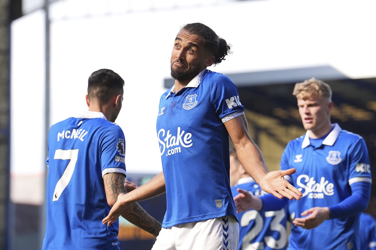 Everton's Dominic Calvert-Lewin, centre, celebrates scoring his side's first goal of the game, during the English Premier League soccer match between Everton and Burnley, at Goodison Park, in Liverpool, England, Saturday April 6, 2024. (Martin Rickett/PA via AP)
