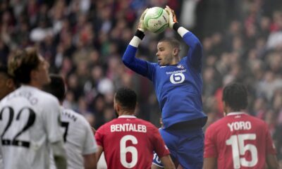 Lille's goalkeeper Lucas Chevalier save the ball during the Europa Conference League quarter final second leg soccer match between Lille and Aston Villa at the Pierre Mauroy stadium in Villeneuve d'Ascq, northern France, Thursday, April 18, 2024. (AP Photo/Christophe Ena)