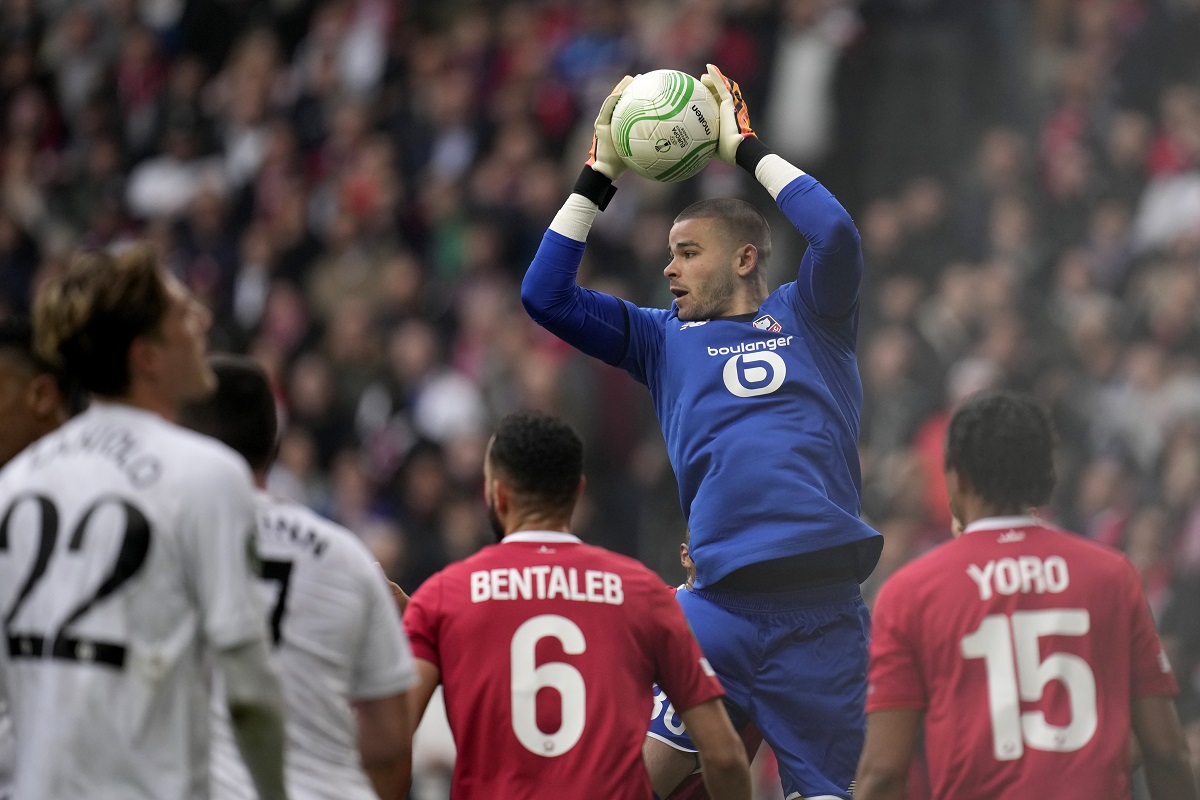Lille's goalkeeper Lucas Chevalier save the ball during the Europa Conference League quarter final second leg soccer match between Lille and Aston Villa at the Pierre Mauroy stadium in Villeneuve d'Ascq, northern France, Thursday, April 18, 2024. (AP Photo/Christophe Ena)
