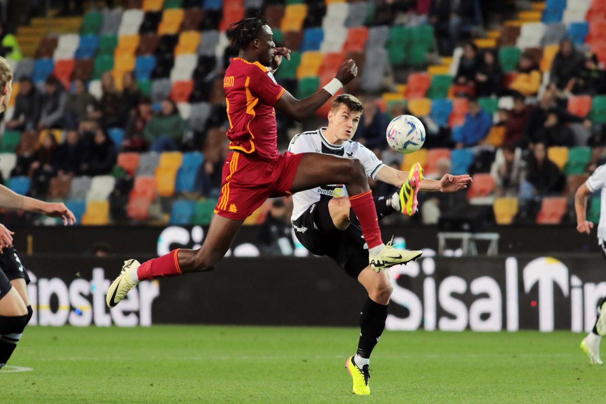 Udinese's Jaka Bijol, right, fights for the ball with Roma's Tammy Abraham during a Serie A soccer match between Udinese and Roma in Udine, northeastern Italy, Thursday, April 25, 2024. (Photo by Andrea Bressanutti/LaPresse via AP)