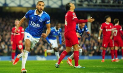 Everton's Dominic Calvert-Lewin, left, celebrates after scoring his side's second goal during the English Premier League soccer match between Everton and Liverpool at the Goodison Park stadium in Liverpool, Britain, Wednesday, April 24, 2024. (AP Photo/Jon Super)