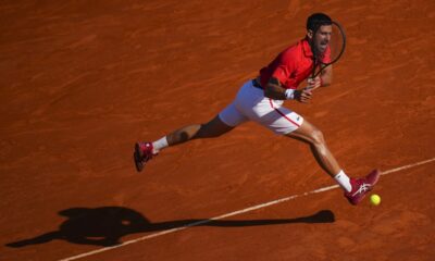 Serbia's Novak Djokovic returns the ball to Casper Ruud, of Norway, during their Monte Carlo Tennis Masters semifinal match in Monaco, Saturday, April 13, 2024. (AP Photo/Daniel Cole)