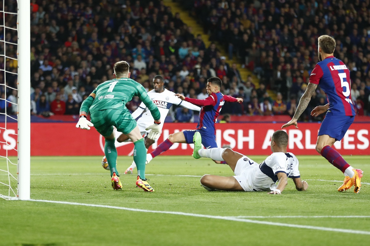 PSG's Ousmane Dembele scores his side's first goal during the Champions League quarterfinal second leg soccer match between Barcelona and Paris Saint-Germain at the Olimpic Lluis Companys stadium in Barcelona, Spain, Tuesday, April 16, 2024. (AP Photo/Joan Monfort)