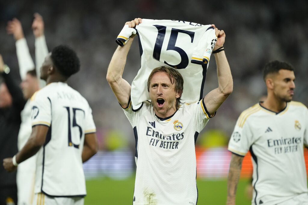 Real Madrid's Luka Modric celebrates after winning the Champions League semifinal second leg soccer match between Real Madrid and Bayern Munich at the Santiago Bernabeu stadium in Madrid, Spain, Wednesday, May 8, 2024. Real Madrid won 2-1. (AP Photo/Jose Breton)