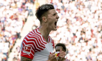 Leipzig's Benjamin Sesko celebrates after scoring his side's first goal during German Bundesliga soccer match between RB Leipzig and Werder Bremen in Leipzig, Germany, Saturday, May 11, 2024. (Hendrik Schmidt/dpa via AP)