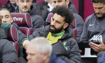 Liverpool's Mohamed Salah sits on the substitute bench ahead of the English Premier League match between West Ham United and Liverpool, at London stadium, in London, Saturday April 27, 2024. (Jonathan Brady/PA via AP)