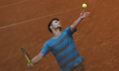 Serbia's Miomir Kecmanovic serves against Russia's Daniil Medvedev during their second round match of the French Open tennis tournament at the Roland Garros stadium in Paris, Thursday, May 30, 2024. (AP Photo/Aurelien Morissard)