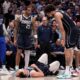 Dallas Mavericks' Markieff Morris, left, P.J. Washington (25), head coach Jason Kidd, center rear, and Dereck Lively II, right, look toward Luka Doncic, bottom, after Doncic and Oklahoma City Thunder' Luguentz Dort collided competing for a loose ball during the second half in Game 3 of an NBA basketball second-round playoff series, Saturday, May 11, 2024, in Dallas. (AP Photo/Tony Gutierrez)