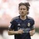 Real Madrid's Luka Modric runs on the pitch during a Spanish La Liga soccer match between Granada FC and Real Madrid at Los Carmanes stadium in Granada, Spain, Saturday, May 11, 2024. (AP Photo/Fermin Rodriguez)