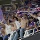 Forentina supporters cheer on their team players before the Conference League final soccer match between Olympiacos FC and ACF Fiorentina at OPAP Arena in Athens, Greece, Wednesday, May 29, 2024. (AP Photo/Petros Giannakouris)