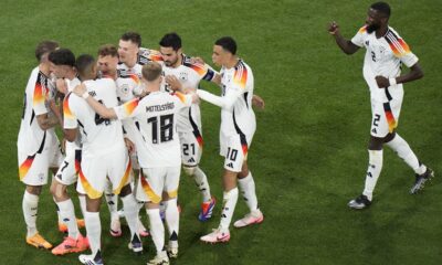 Germany players celebrate their side's third goal during of the Group A match between Germany and Scotland at the Euro 2024 soccer tournament in Munich, Germany, Friday, June 14, 2024. (AP Photo/Sergei Grits)
