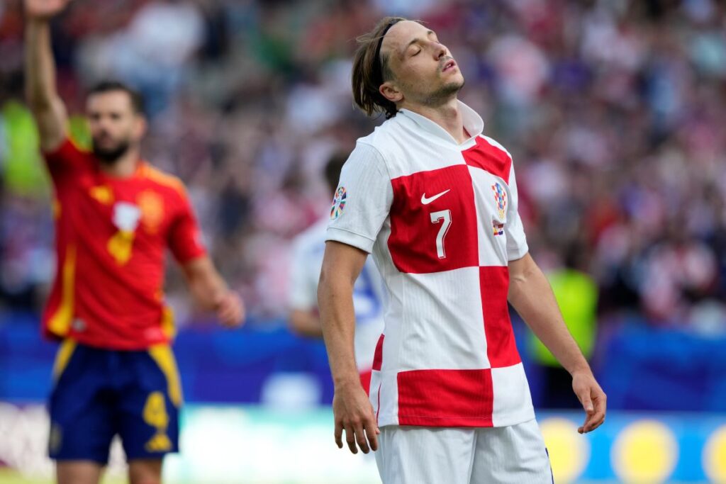 Croatia's Lovro Majer reacts during a Group B match between Spain and Croatia at the Euro 2024 soccer tournament in Berlin, Germany, Saturday, June 15, 2024. (AP Photo/Ebrahim Noroozi)