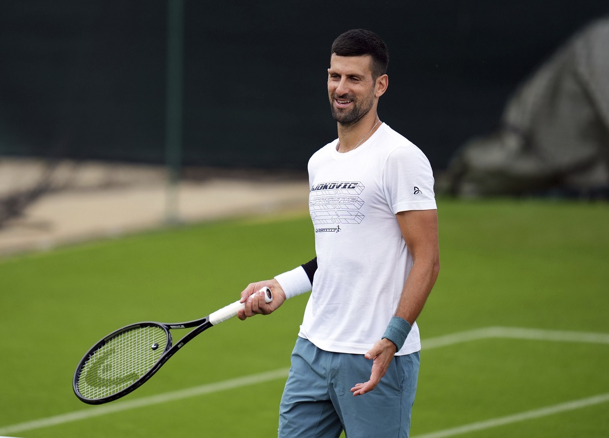 Serbia's Novak Djokovic during a training session at the All England Lawn Tennis and Croquet Club in Wimbledon ahead of the Wimbledon tennis tournament, Monday June 24, 2024. (John Walton/PA via AP)