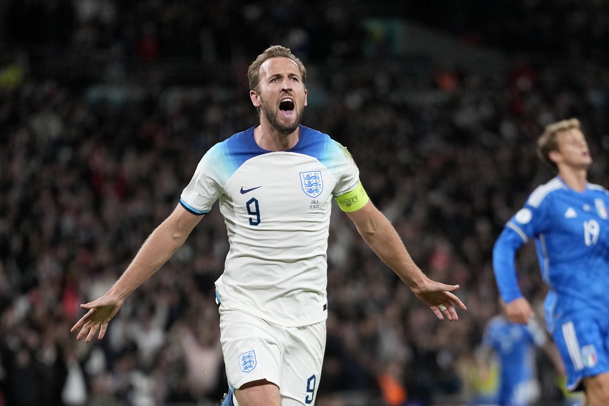 FILE - England's Harry Kane celebrates after scoring his side's third goal during the Euro 2024 group C qualifying soccer match between England and Italy at Wembley stadium in London, Tuesday, Oct. 17, 2023. The unpredictability of the European Championship, which kicks off in Munich on Friday, is what makes it such compelling viewing. Even in its expanded format of 24 teams, there is always the potential for a surprise. (AP Photo/Kirsty Wigglesworth, File)