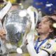 Real Madrid's Luka Modric celebrates with the trophy after winning the Champions League final soccer match between Borussia Dortmund and Real Madrid at Wembley stadium in London, Saturday, June 1, 2024. (Mike Egerton/PA via AP)