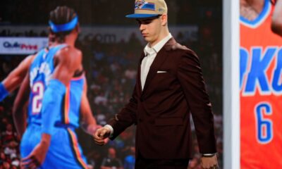 Nikola Topic walks off the stage after being selected by the Oklahoma City Thunder as the 12th pick during the first round of the NBA basketball draft, Wednesday, June 26, 2024, in New York. (AP Photo/Julia Nikhinson)