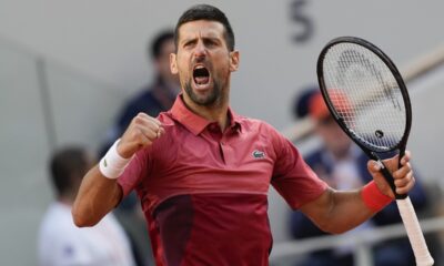 Serbia's Novak Djokovic clenches his fist after holding his service game and reaching 5-5 in the fourth set during his fourth round match of the French Open tennis tournament against Argentina's Francisco Cerundolo at the Roland Garros stadium in Paris, Monday, June 3, 2024. (AP Photo/Thibault Camus)