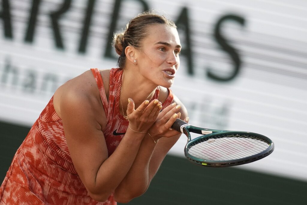 Aryna Sabalenka of Belarus reacts after missing a shot against Russia's Mirra Andreeva during their quarterfinal match of the French Open tennis tournament at the Roland Garros stadium in Paris, Wednesday, June 5, 2024. (AP Photo/Christophe Ena)