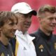 Real Madrid's Luka Modric, from left, Real Madrid's head coach Carlo Ancelotti and Real Madrid's Toni Kroos stand together during a training session ahead of the Champions League final soccer match between Borussia Dortmund and Real Madrid at Wembley Stadium in London, Friday, May 31, 2024.(AP Photo/Ian Walton)